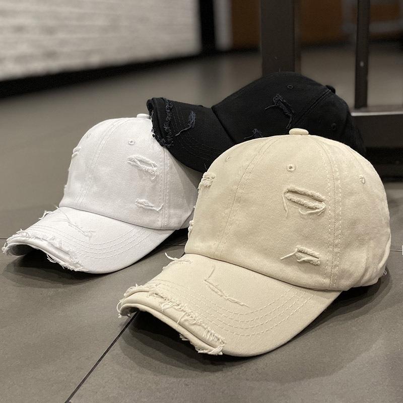 Korean style ins solid color distressed ripped peaked cap women's spring and summer fashion all-match Street Sun-proof curved brim baseball cap