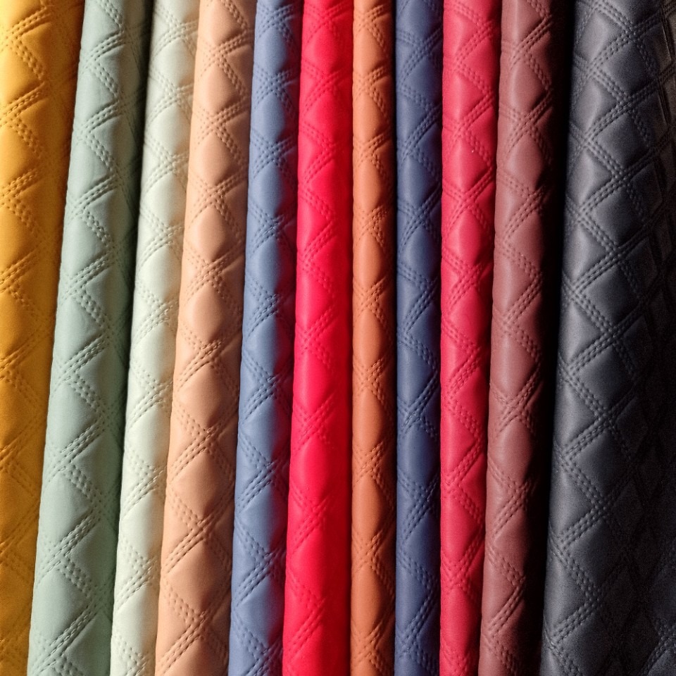 Factory in stock wholesale eco-friendly luggage leather fabric 1.0 plucking bottom embossed rhombus leather