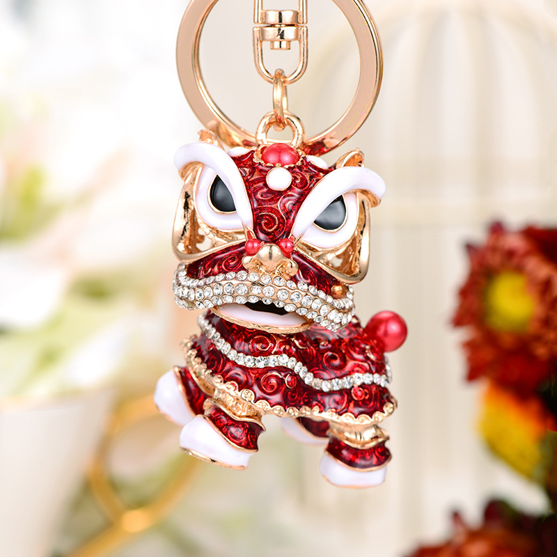 Chinese style rhinestone keychain lion dance metal auto parts creative key chain Chinese style Kirin cartoon pendant