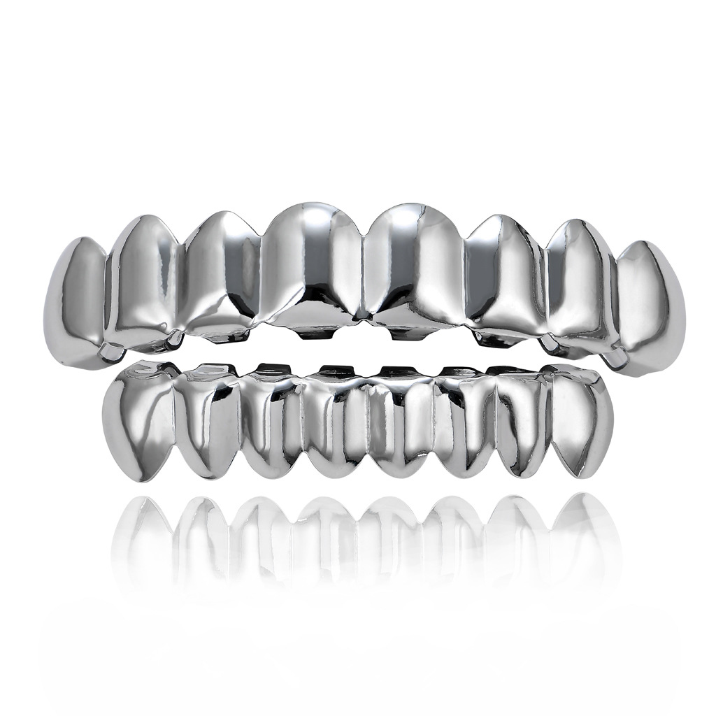 Picture of Europe and the United States HIPHOP hip-hop gold braces upper teeth 8 lower teeth 8 real gold plating 18K gold hip-hop braces wholesale