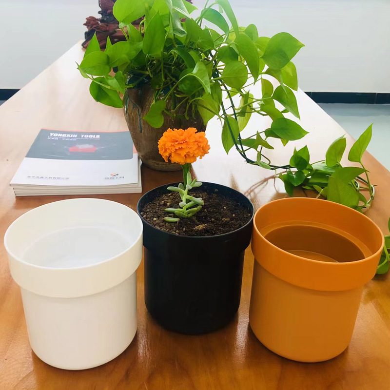 Picture of A generation of flowerpot piggy bank creative with lock iron box insurance key Mini Storage box hidden money gift