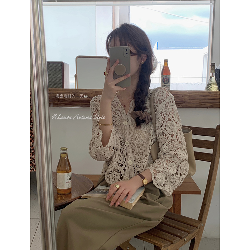 Picture of Women's long-sleeved hollow-out knitted cardigan summer wear new crocheted short chic small shirt with skirt air conditioning top