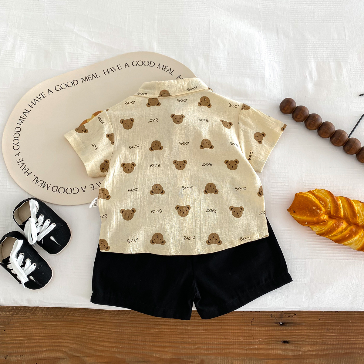 Picture of Ins Boys 2025 Summer Style Handsome Gentleman Bow Tie Short-Sleeved Printed Bear Shirt Shorts Two-Piece Suit