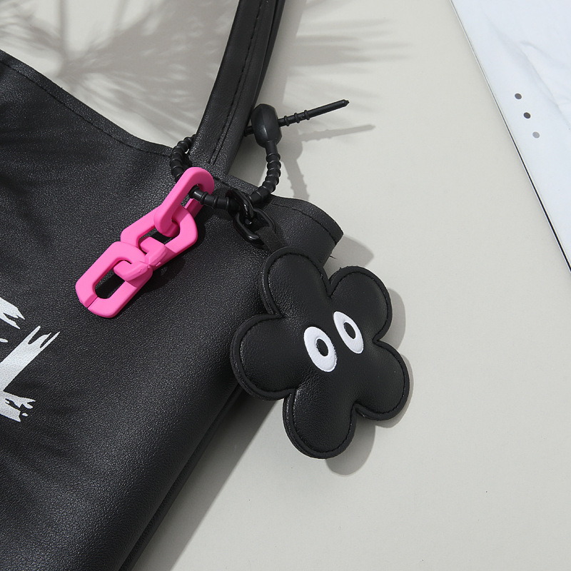 Picture of Creative Car Bag Accessories Ins Advanced Sense Leather Handmade Flower Eye Bag Pendant Pendant Keychain