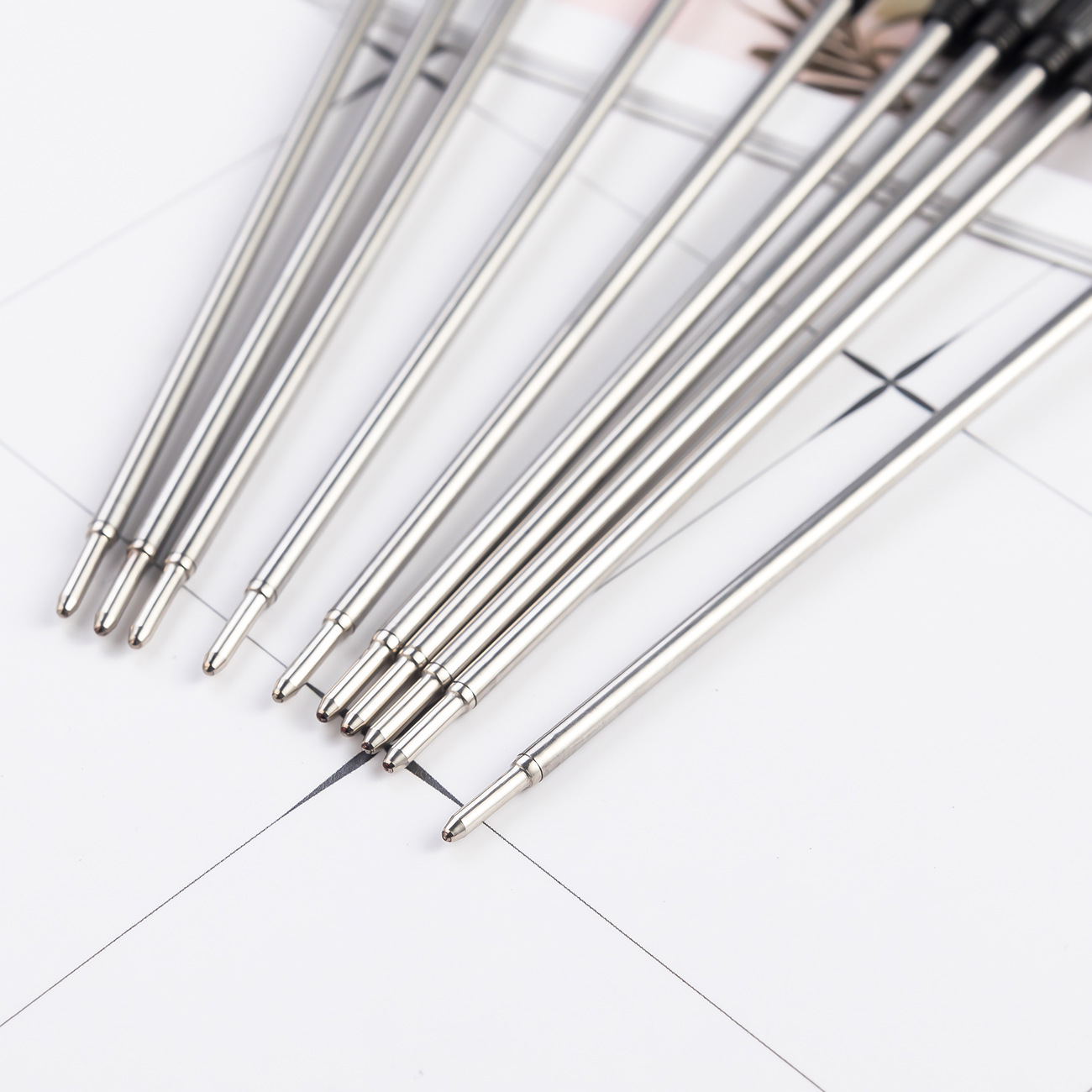 Picture of New Spot Small Gao Shibi Metal Refill Student Stationery Ballpoint Pen Refill Small Crown Pen Refill