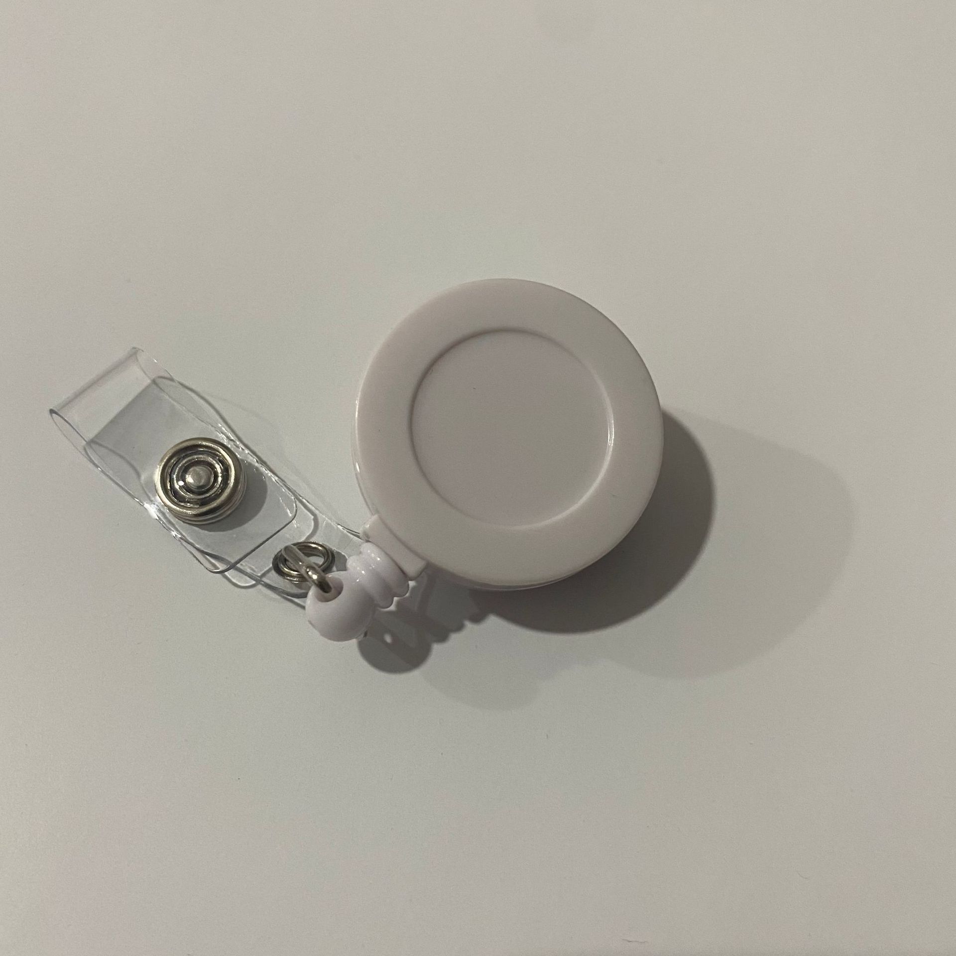 Picture of Spot Crocodile Clip Easy-Pull Buckle 360 Rotating Id Buckle Outdoor Anti-Lost Cable Puller Chest Card Clip Colorful Telescopic Buckle