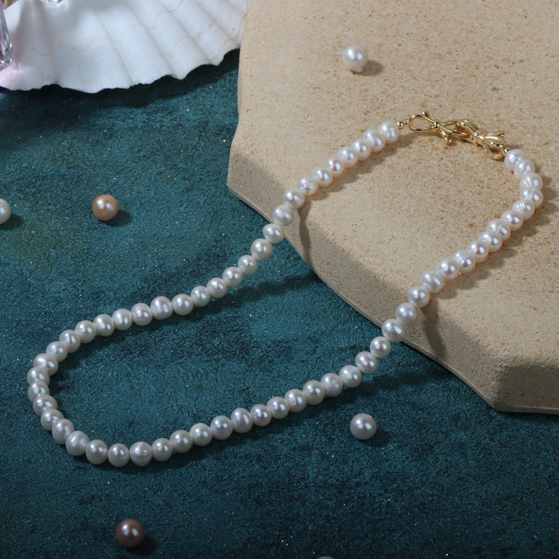 Picture of Spot Wholesale Natural Freshwater Pearl Necklace Ins Design Clavicle Chain New Niche Accessible Luxury Bow Buckle