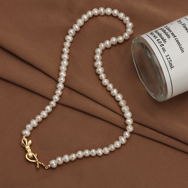 Picture of Spot Wholesale Natural Freshwater Pearl Necklace Ins Design Clavicle Chain New Niche Accessible Luxury Bow Buckle