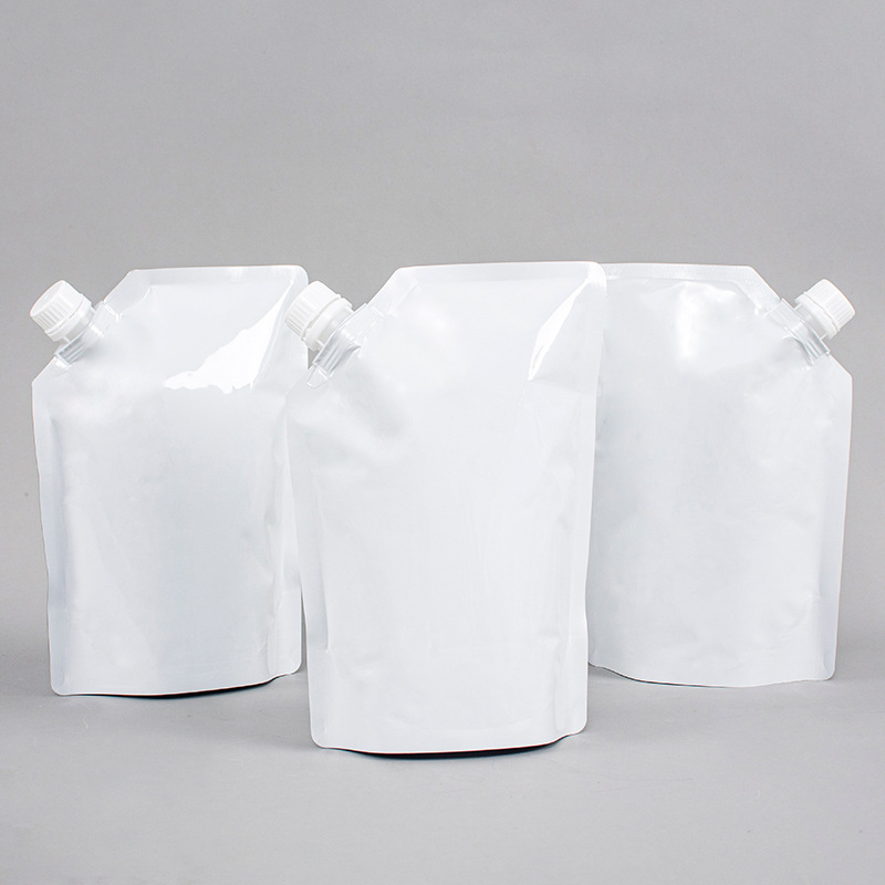 Picture of in stock pure white aluminum foil suction nozzle bag 1L self-standing bag packing bag take-out soup liquid bag wine and beverage packaging bag