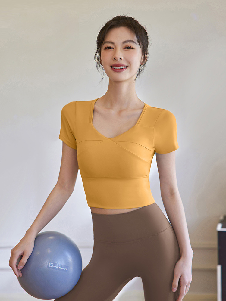 Picture of 2025 Summer Yoga Wear Women's Short Sleeve Fitness Clothes Training Tops Slim Fit Running Sports T-Shirt