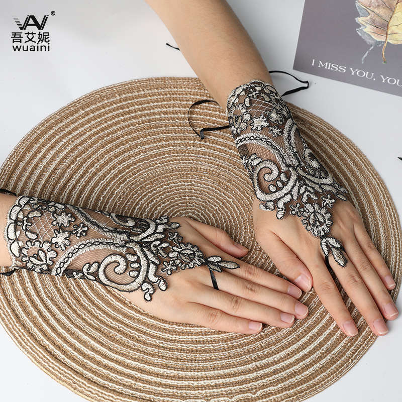 Picture of Hook-Finger Short Mesh Lace Bow Sleeves European and American Bride Wedding Dress Hand Sleeves Short Lace Gloves Wholesale