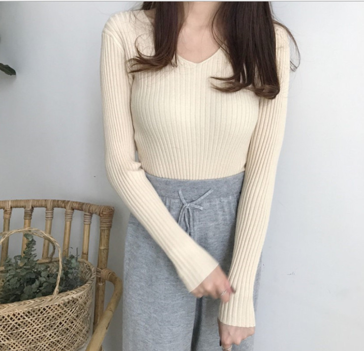 Picture of 2024 Korean Style V Neck Core-Spun Yarn Slimming Look Knitted Long-Sleeved Slim Tight Warm Bottoming Shirt Top Sweater for Women