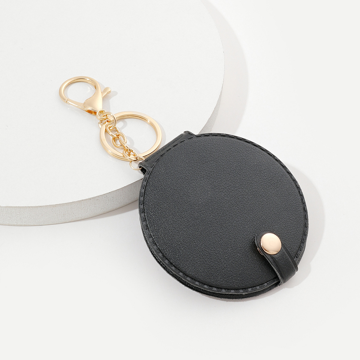 Creative round makeup mirror keychain pu leather car bag pendant carry-on solid color mini small mirror