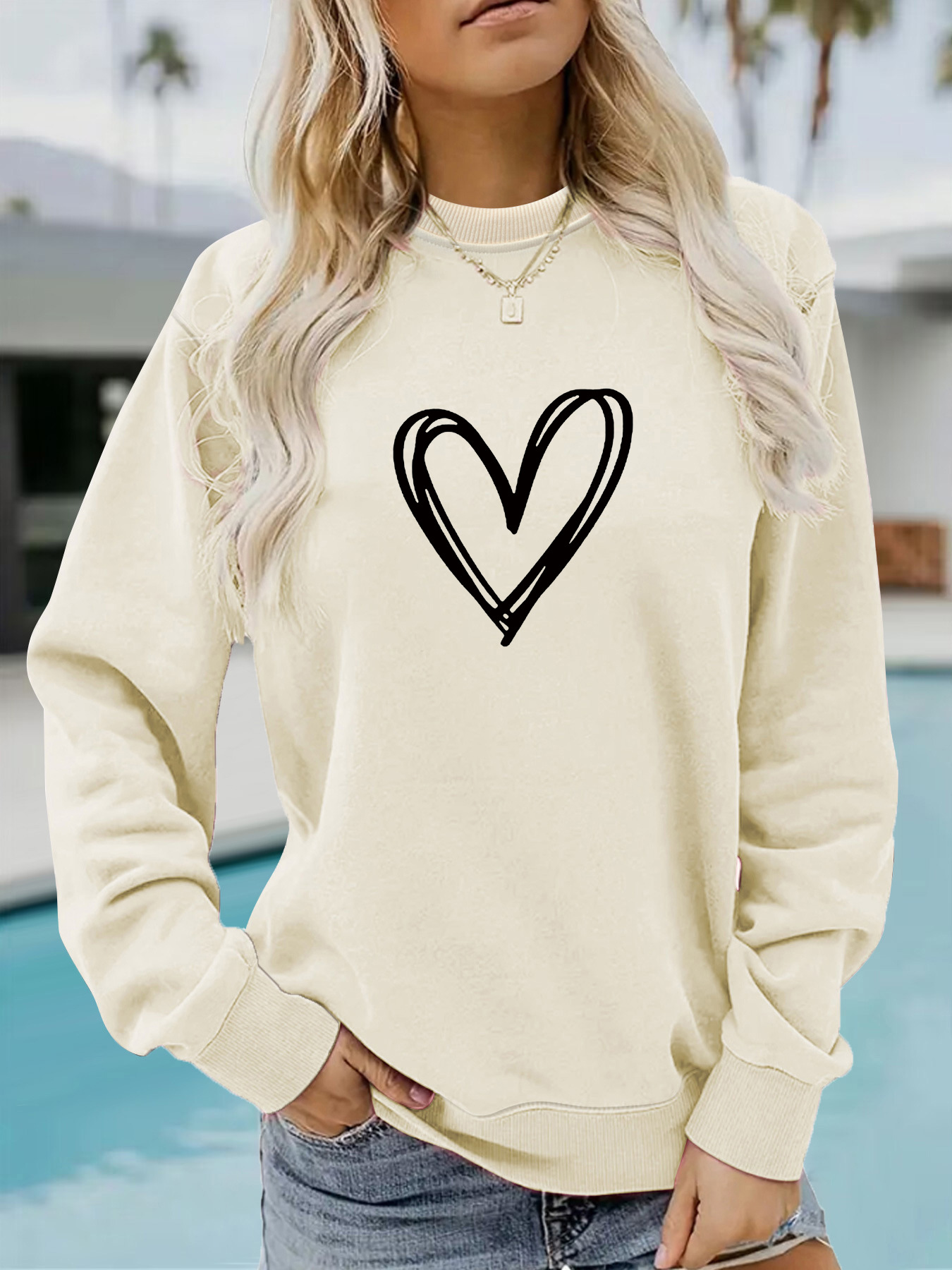 Picture of Europe and the United States cross-border autumn and winter women's casual long sleeve round neck heart-shaped printed pullover sweatshirt sweater wholesale