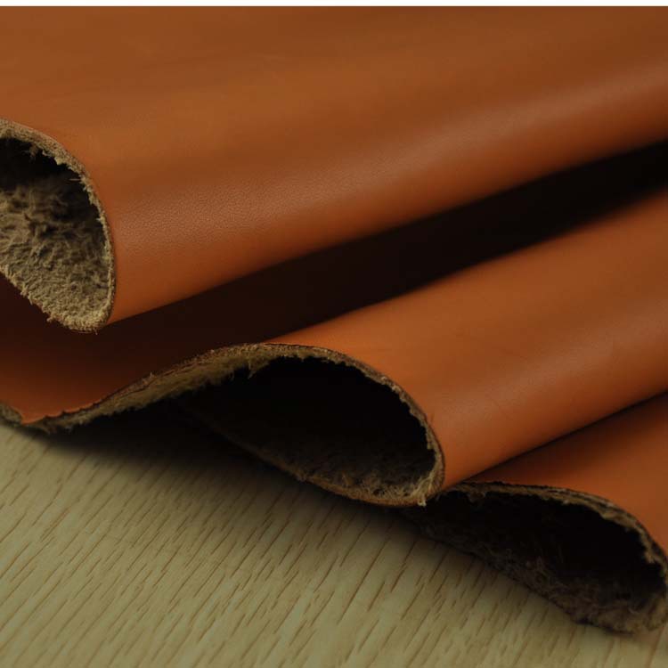 Picture of Two-layer Brown trademark cow leather wholesale pressure change trademark leather manufacturers color change trademark leather