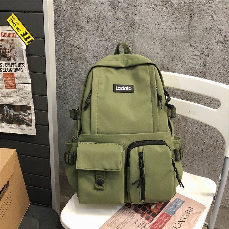 2024 new Korean version of simple student schoolbag anti-theft anti-seismic college style backpack computer backpack wholesale LOGO