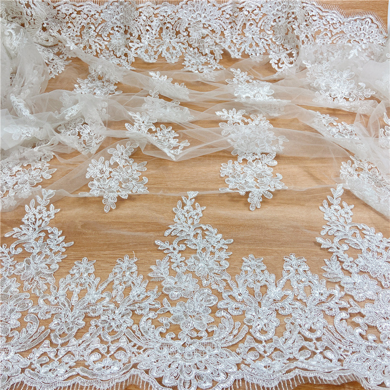 Factory wholesale spot water soluble mesh embroidery lace strand rope embroidery fabric wedding dress bilateral lace embroidery fabric