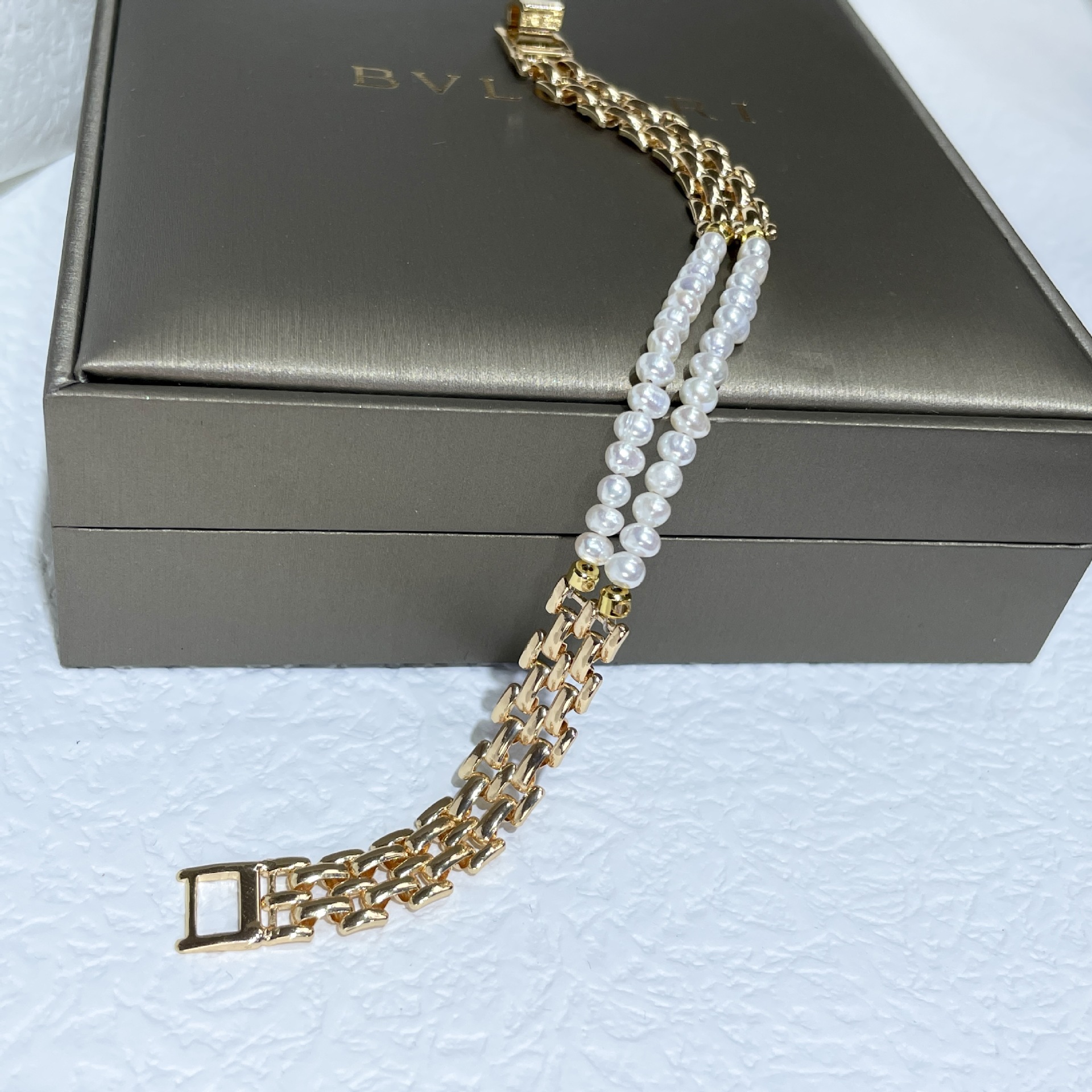 Picture of New Style Natural Small Pearl Double Layer Stacked Wearing Bracelet Women's Stitching Wide Chain Design Light Luxury Woven Watch Chain