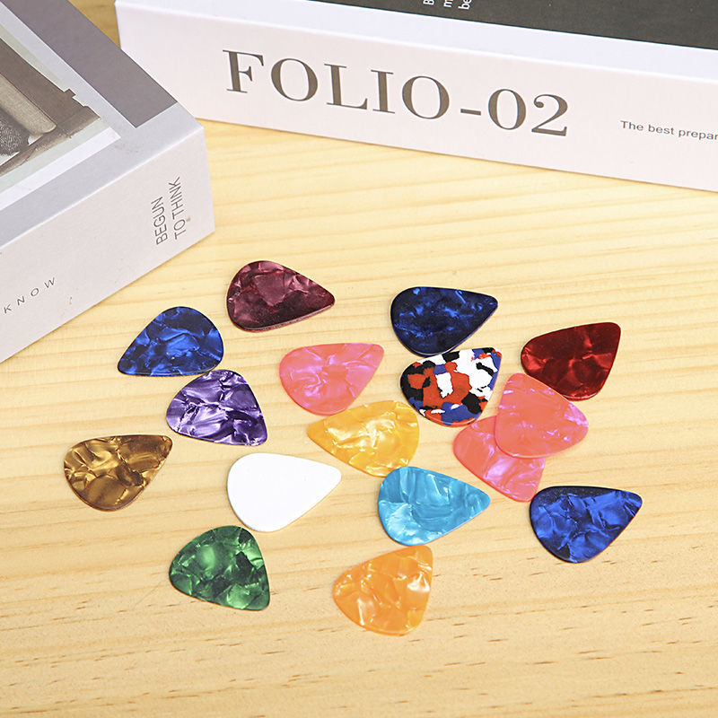 Picture of Guitar pick wooden guitar electric guitar ukulele pick Universal celluloid pick wear-resistant elastic-resistant thin