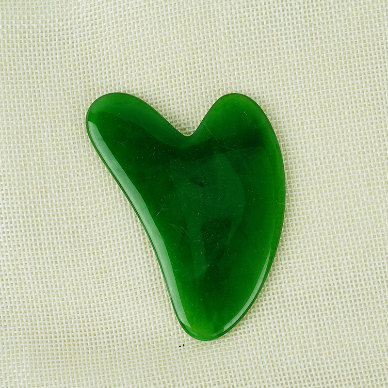Picture of Manufacturer's Wholesale Resin Heart-Shaped Gua Sha Tools for Massaging the Back, Neck, Waist, and Full Body Meridians, Made of Natural Materials