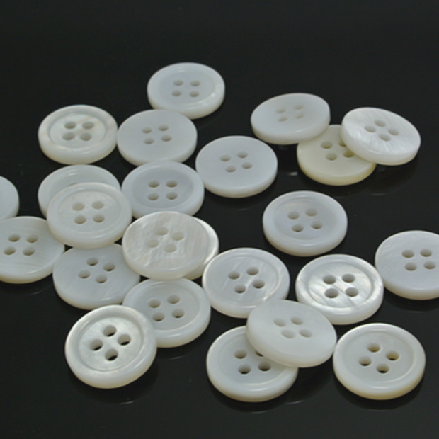 Button wholesale mini thin edge four-eye shell buckle
