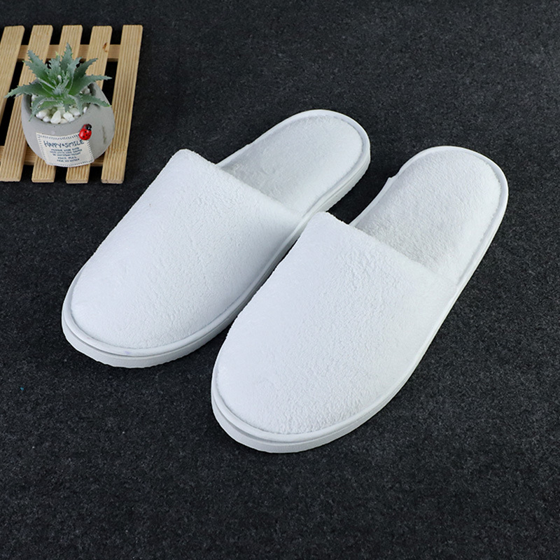 Picture of Disposable solid color coral fleece slippers hotel homestay couple slippers room hotel thickened slippers wholesale
