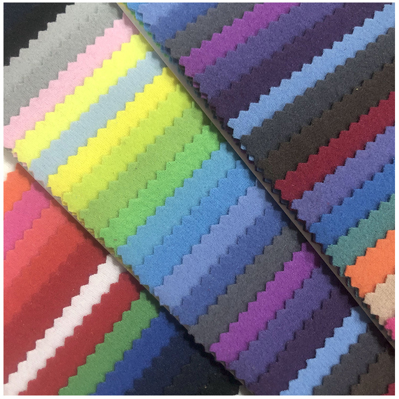 Spot school uniform garden suit fabric 240g thickened warp knitted flannel drawstring pocket single-sided short velvet brushed golden velvet