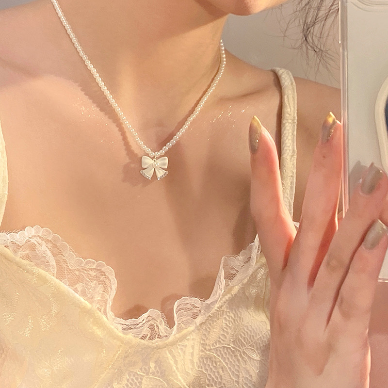 Pearl Bow Necklace Women's Summer High-end Design Niche Beaded Clavicle Chain Choker Necklace Accessories