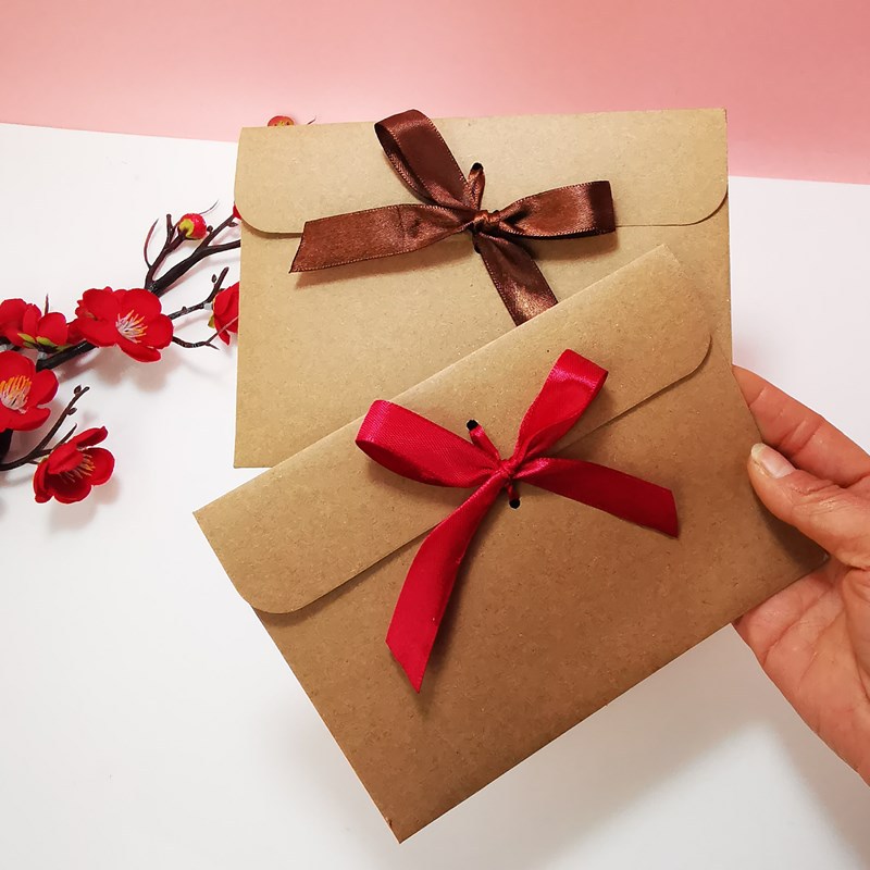 Picture of European envelope Kraft paper style vintage greeting card blessing card packaging bag creative bow CD bag wholesale