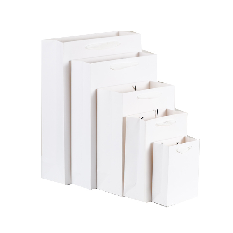 Vertical white cardboard packaging bag clothing handbag gift bag jewelry glasses paper bag hand bag spot wholesale