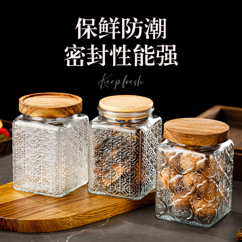 Factory supply square carved dried fruit storage tank wooden lid coarse cereals sealed moisture-proof transparent good-looking in stock glass bottle