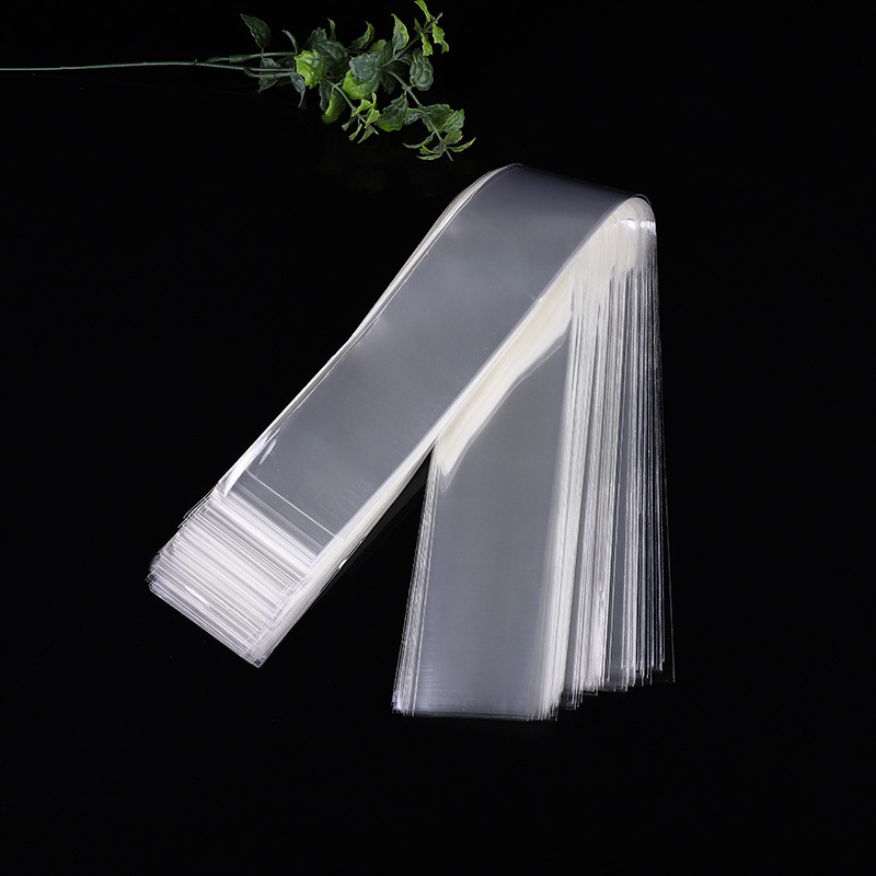 Wrapping paper sheet a roll of flat opp plastic bags 3*52cm a about 200