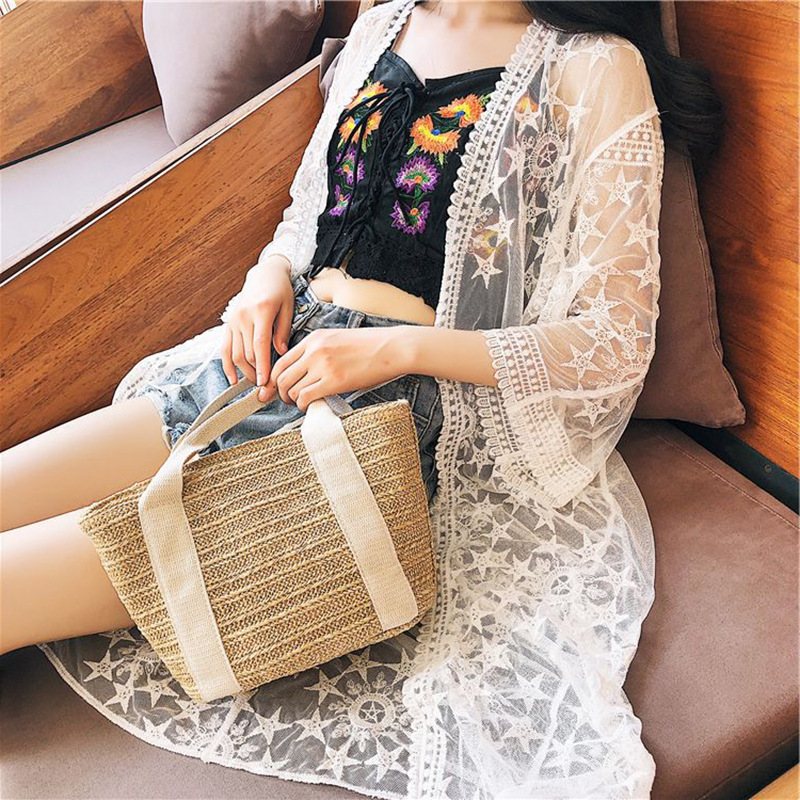 Picture of European and American Cross-border Sunscreen Clothing Women's Summer Seaside Vacation Mid-length Lace Coat Hollow Beach Bikini Blouse
