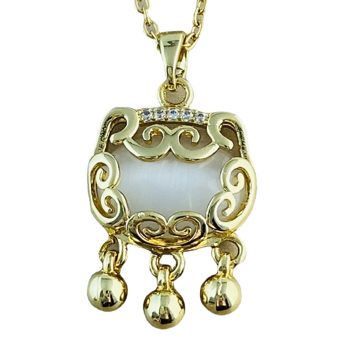 Copper Micro-Inlaid Pendant with Titanium Real Gold Plating, Featuring Cat's Eye Stone, Fox, Pixiu, Four-Leaf Clover, Bag Charm, Safety Buckle, and Butterfly Safety Lock