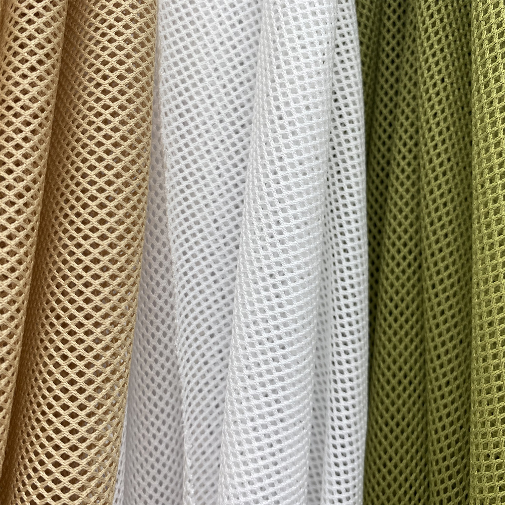 Spot supply of polyester 75D low elastic Four Corners 2x 2 rhombus mesh fabric school uniform sportswear lining cloth square mesh fabric