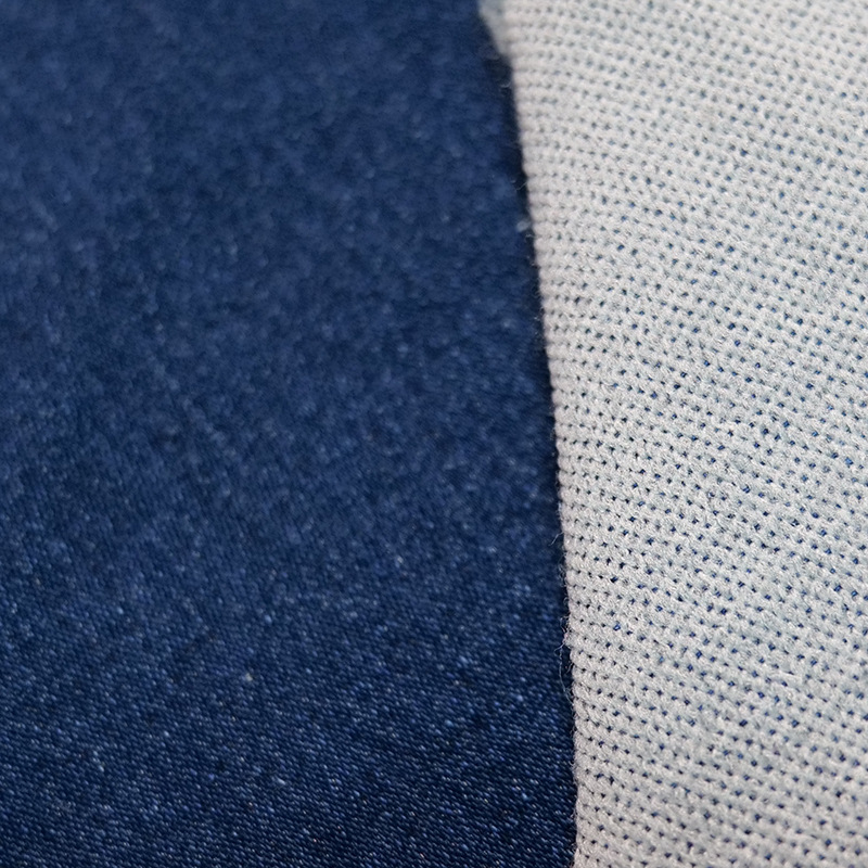 Picture of Stretch Woven Denim Washed Towel Bottom Fabric Imitation Knitted Denim Black Surface White Bottom 7.2oz Plain Fried Snowflake