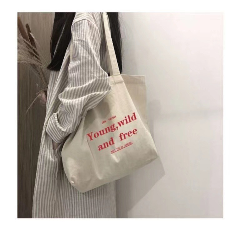 Picture of New Large Capacity Letter Zipper Shoulder Bag Canvas Bag Women's Retro Artistic Simple Student Commuter Tote Bag