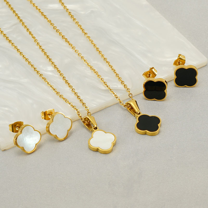 2023 cross-border simple titanium steel plated 18K gold clover natural shell necklace stud earrings jewelry suit wholesale female
