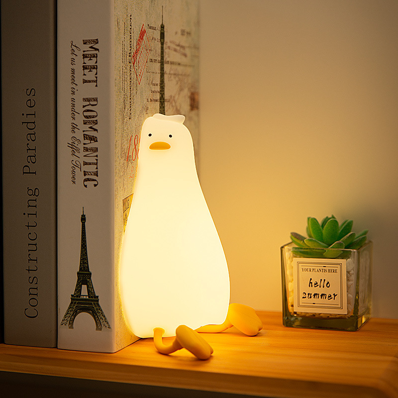 Picture of Cross-border Creative Lying Flat Duck Silicone Lamp Children's Nursing Bedside Accompanying Sleep Pat Charging Holiday Gift Night Light