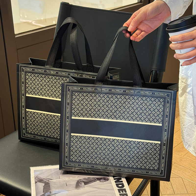 High-grade non-woven clothing store handbag gift packaging gift bag new shopping bag clothes packing bag wholesale