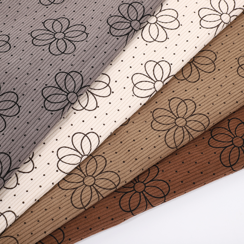 New laser Denim jacquard clothing fabric leather fabric burning flower cutting hollow laser printing cat whiskers wholesale