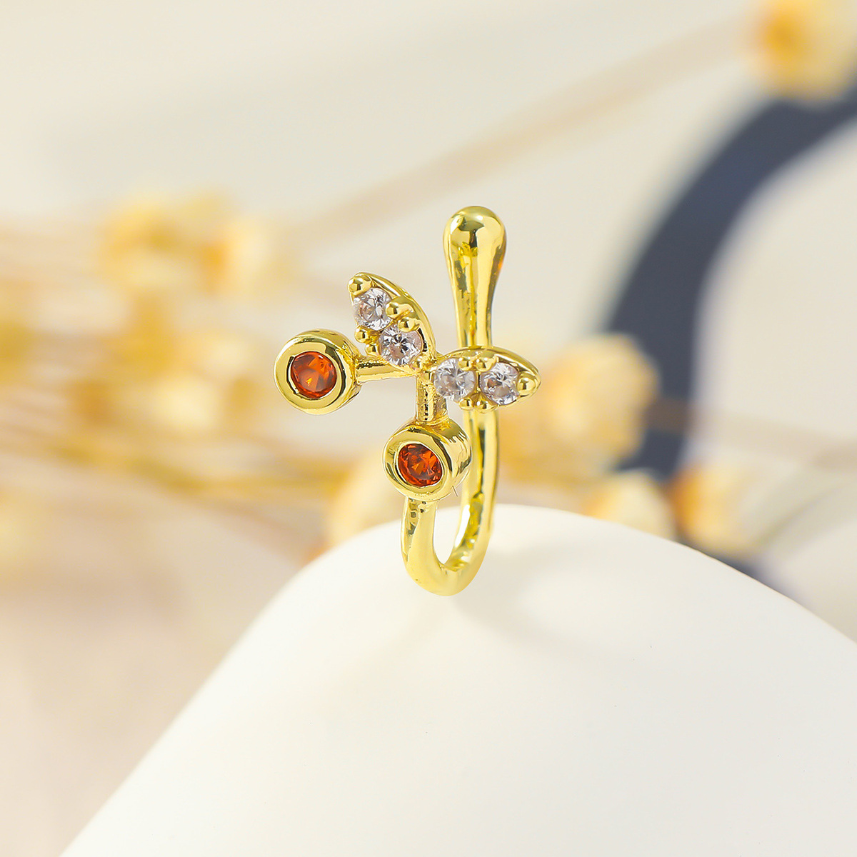Picture of A copper-inlaid stone-free piercing clip-on nose ring Zirconium cherry nose clip nose ornament false nose ring