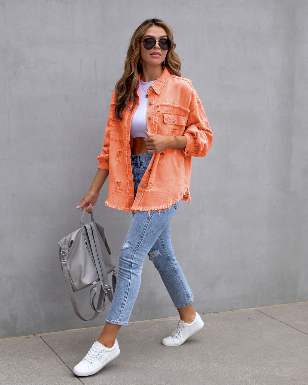Picture of 2025 New European and American Style Mid-Length Raw Edge Ripped Denim Jacket Women's Autumn and Winter Long-Sleeved Casual Lapel Top