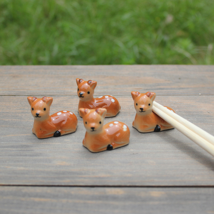 Picture of Ceramic crafts ornaments 12592 deer chopsticks rack sika deer chopsticks rack pen rack factory direct wholesale