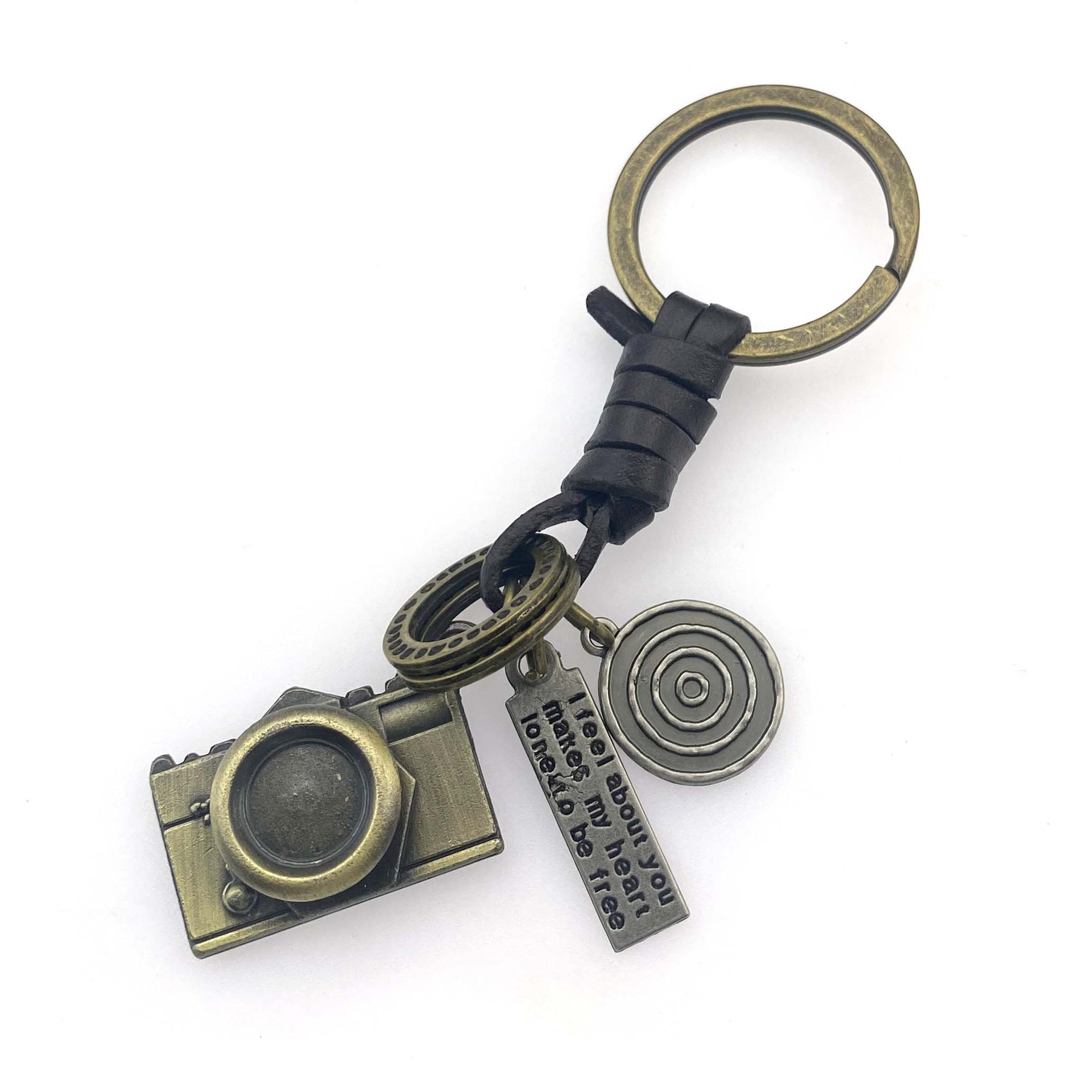 Cross-border European and American men's retro cowhide key chain alloy digital camera model pendant backpack personalized pendant