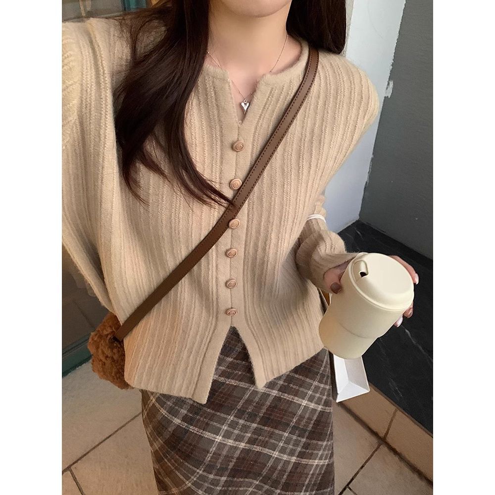 Soft glutinous pit strip apricot long-sleeved knitted sweater for women's autumn Korean versatile slimming hem slit design sweater