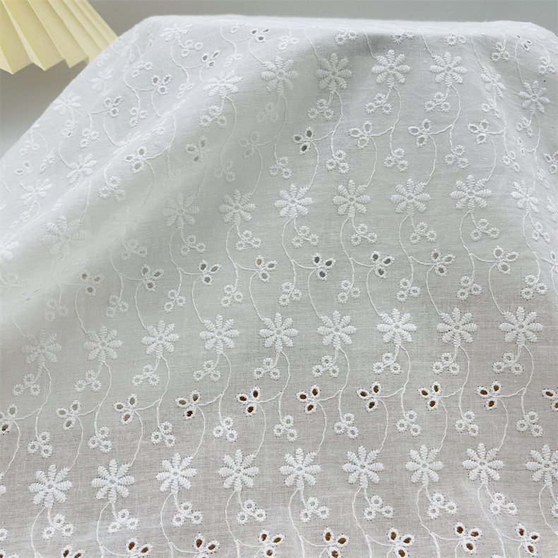 Factory wholesale cotton hollow perforated embroidered cloth summer cotton children's clothing tablecloth DIY lace embroidered fabric
