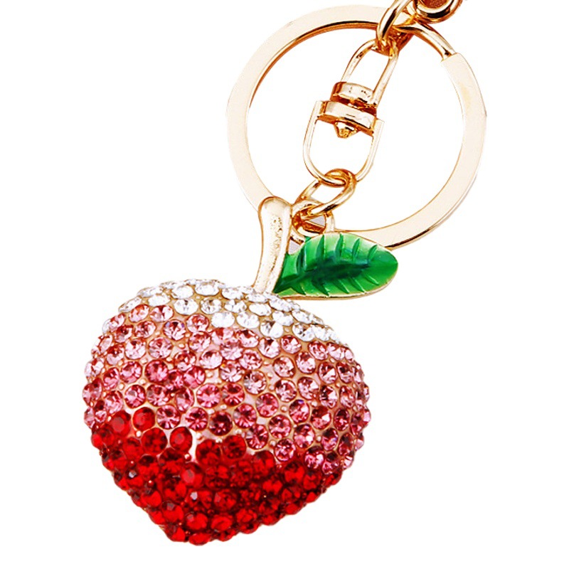 Diamond-encrusted fruit peach car keychain women's cute bag pendant metal key chain ring peach heart Accessories Wholesale