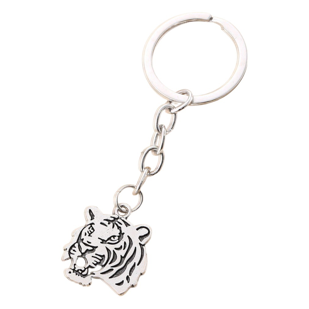 European and American hot sale creative keychain alloy tiger head pendant key ring simple style car luggage decoration pendant