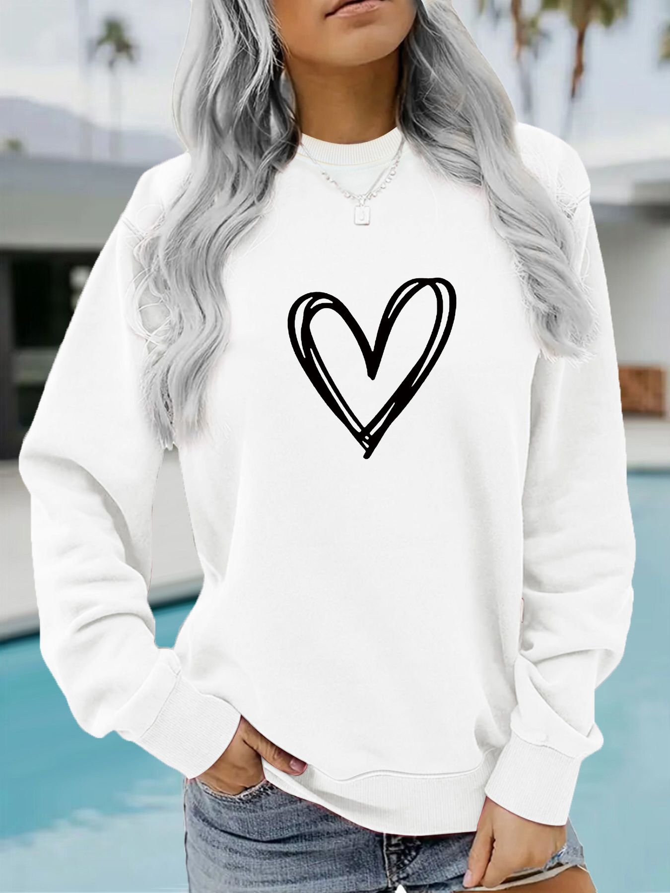 Picture of Europe and the United States cross-border autumn and winter women's casual long sleeve round neck heart-shaped printed pullover sweatshirt sweater wholesale